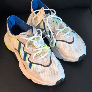 Adidas' White and Blue Sneakers with Neon Accents